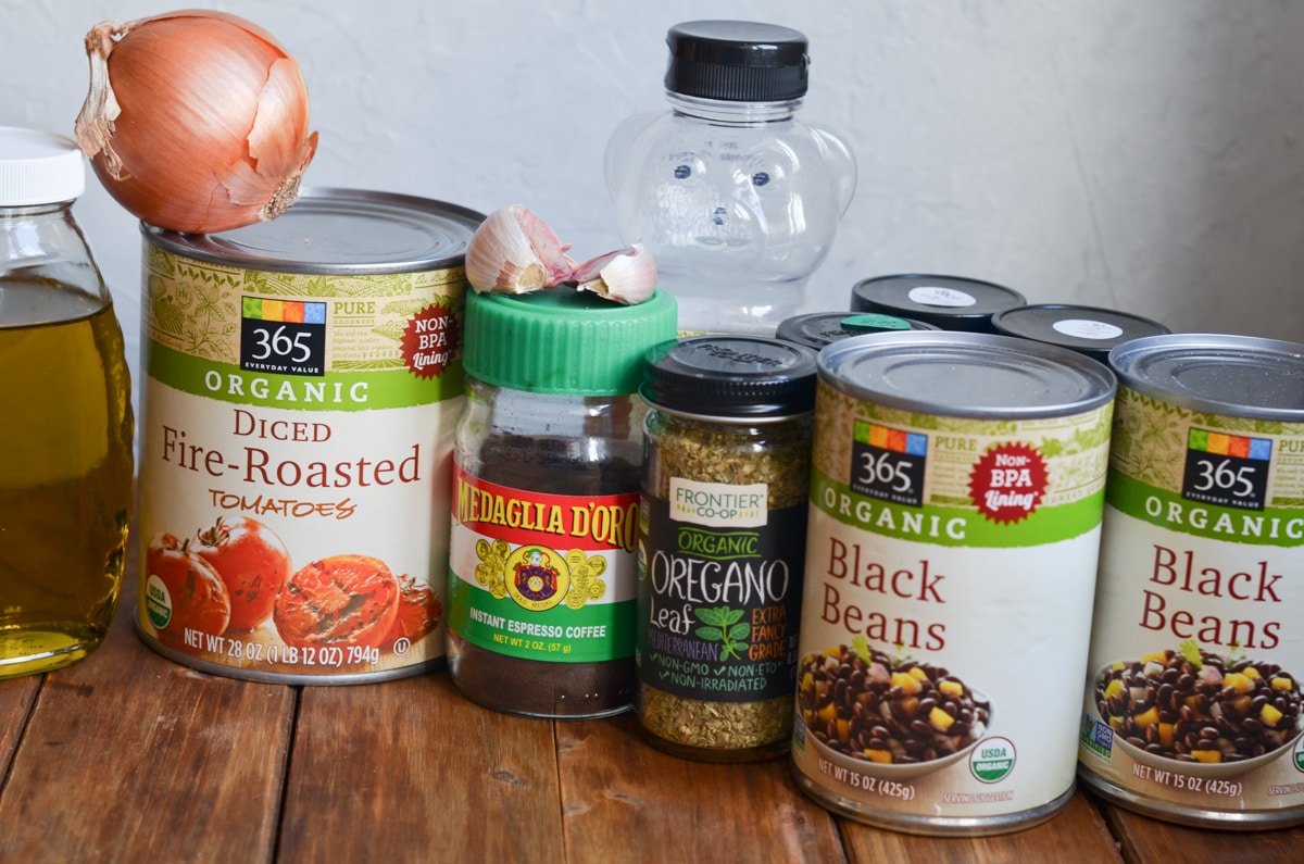 ingredients for black bean chili recipe on counter.