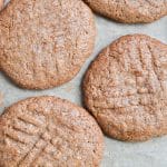 almond butter cookies on baking sheet.