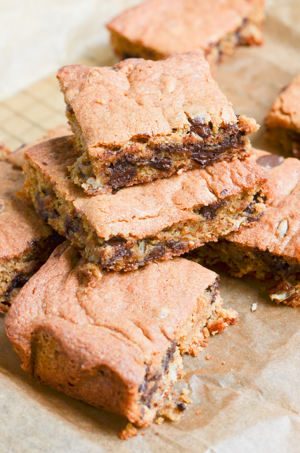 chocolate chip blondies on parchment paper.