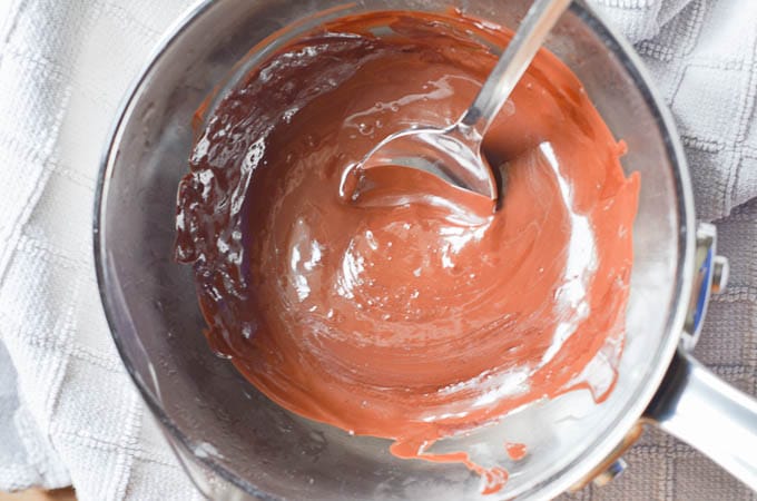 Melted chocolate in saucepan.