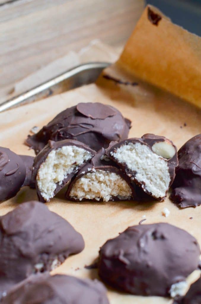 Homemade mounds bars on baking sheet.