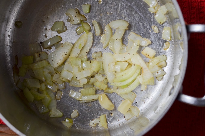 onions and olive oil in soup pot.