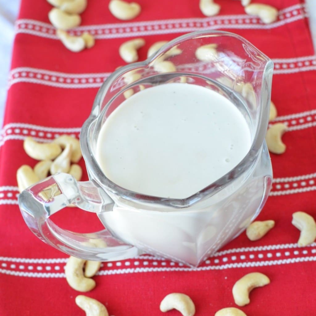 Cashew Cream in glass pitcher - 24 Carrot Kitchen