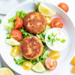 salmon cakes on a plate.