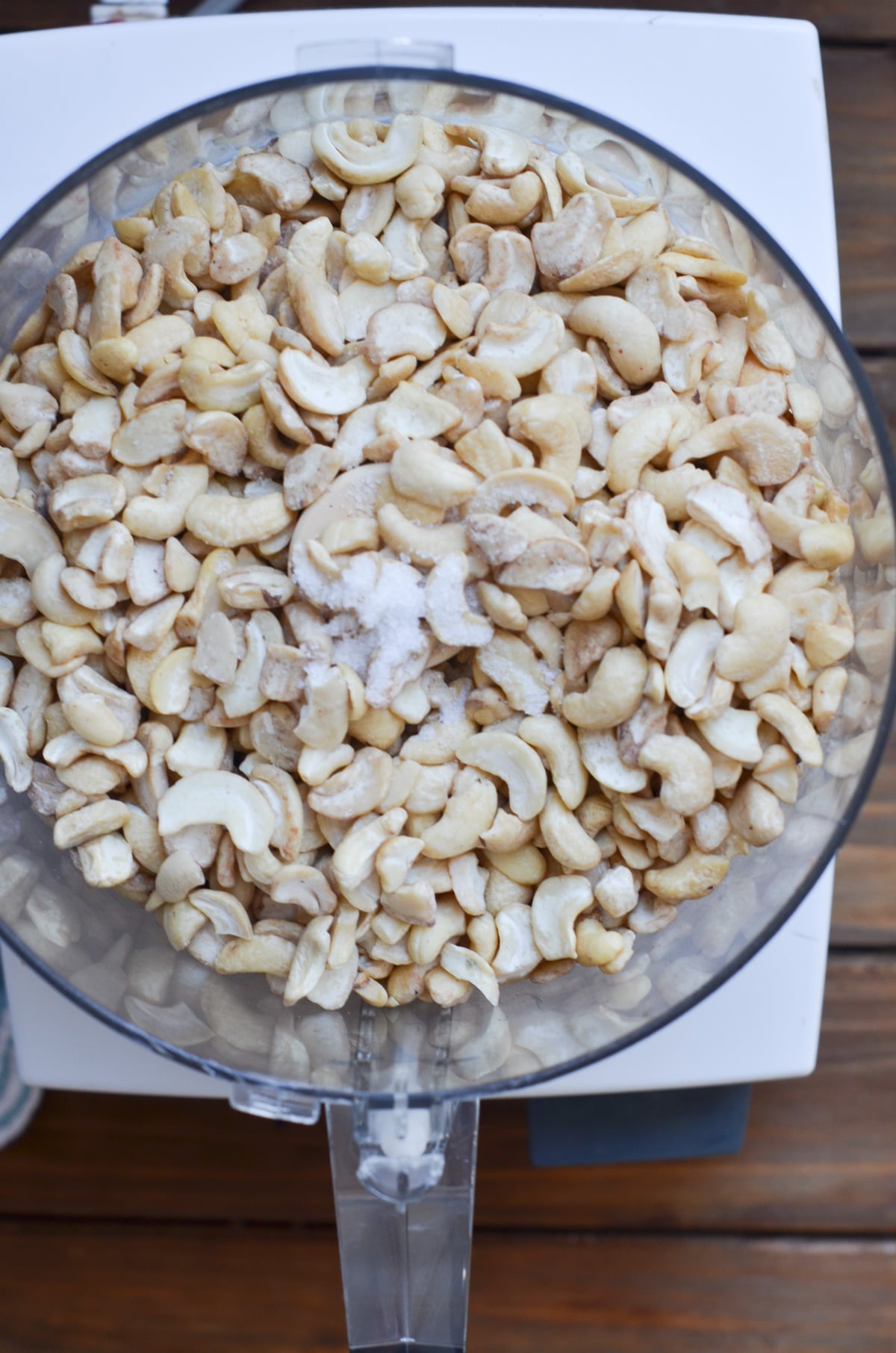 raw cashews in a food processor with 1/4 tsp. of salt.