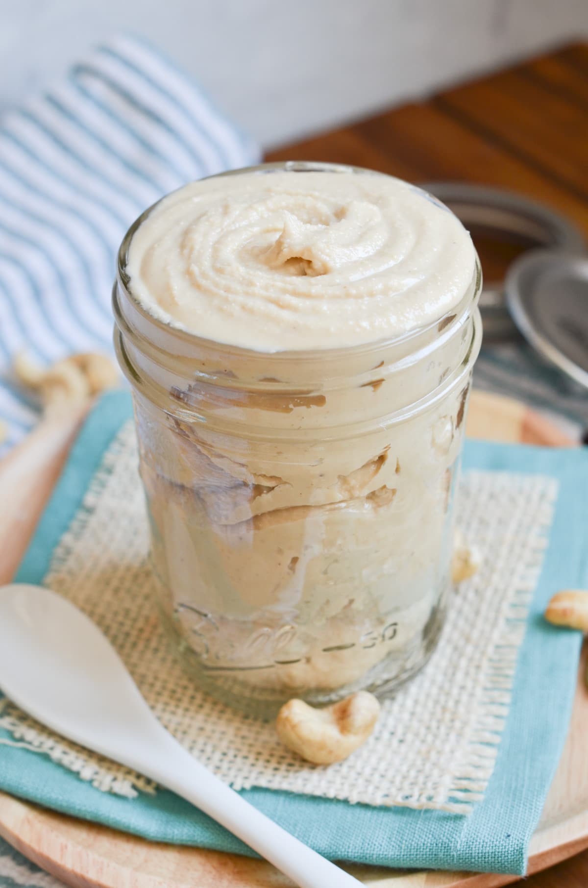 cashew butter in glass jar.