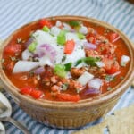 turkey chili in a bowl with toppings.