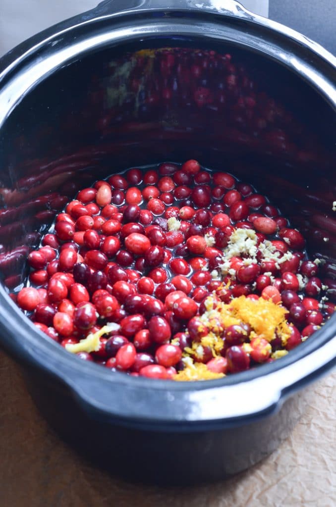 ingredients for Paleo cranberry sauce in slow cooker/crockpot.