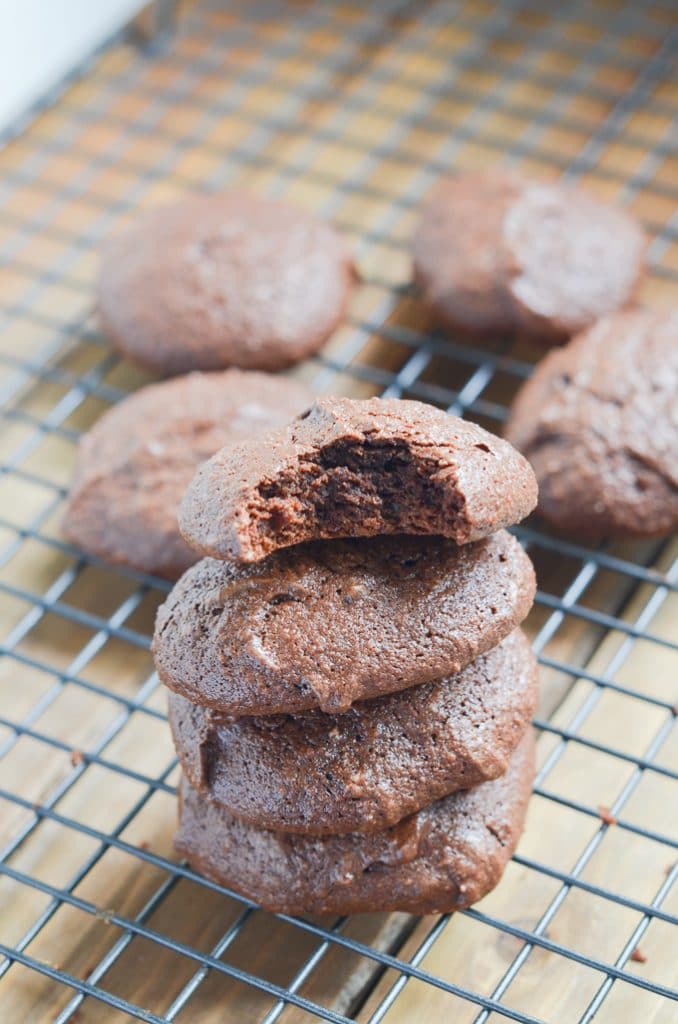 chocolate fudge cookies on cooling rack.