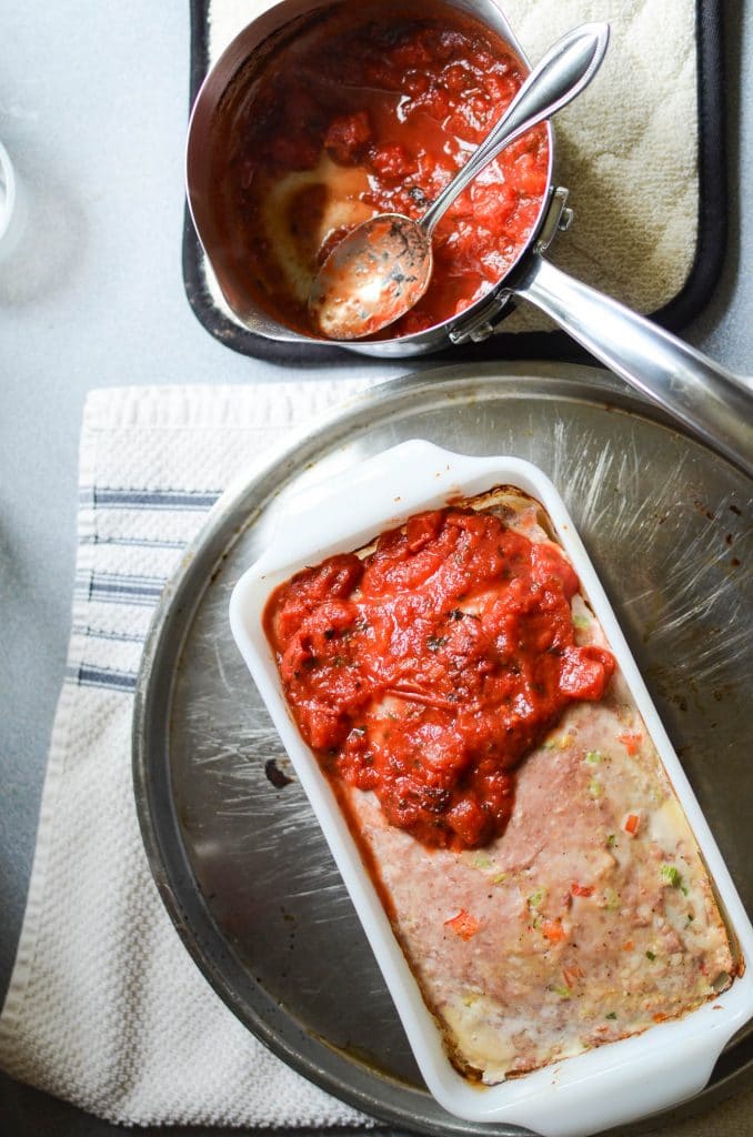 Paleo Meatloaf adding tomato sauce 24 Carrot Kitchen