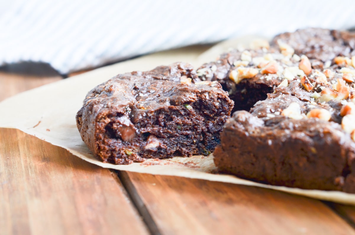 Zucchini Brownies on parchment paper.