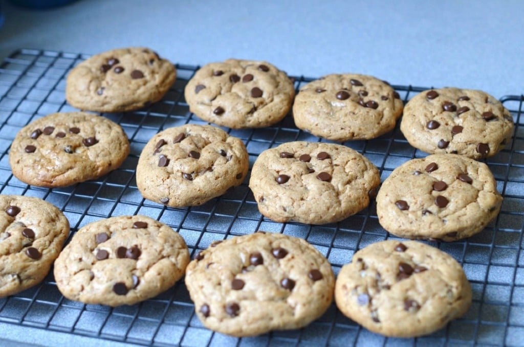 Paleo Chocolate Chip Cookies on cooling rack - 24 Carrot Kitchen