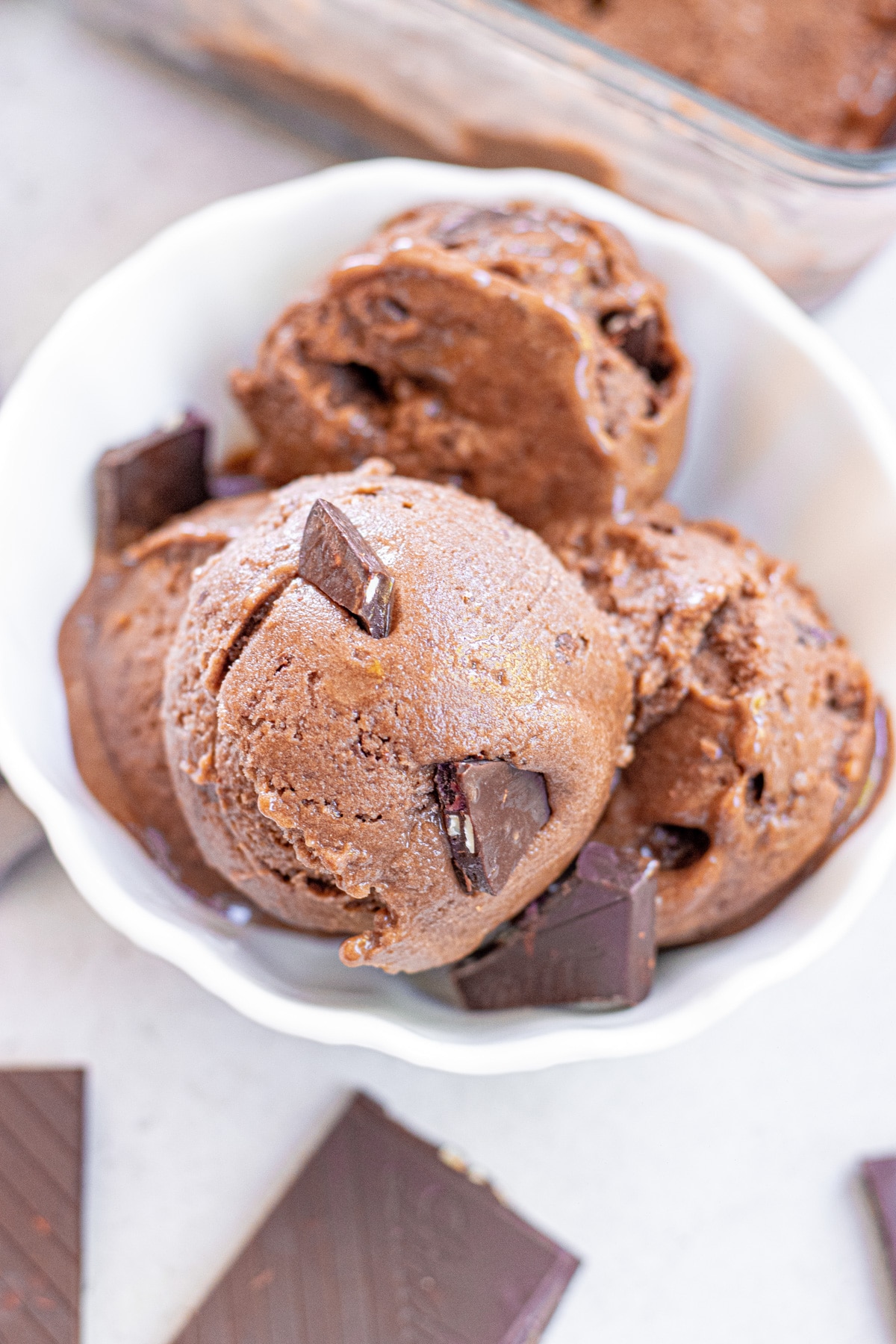 scoops of chocolate banana ice cream in bowl.