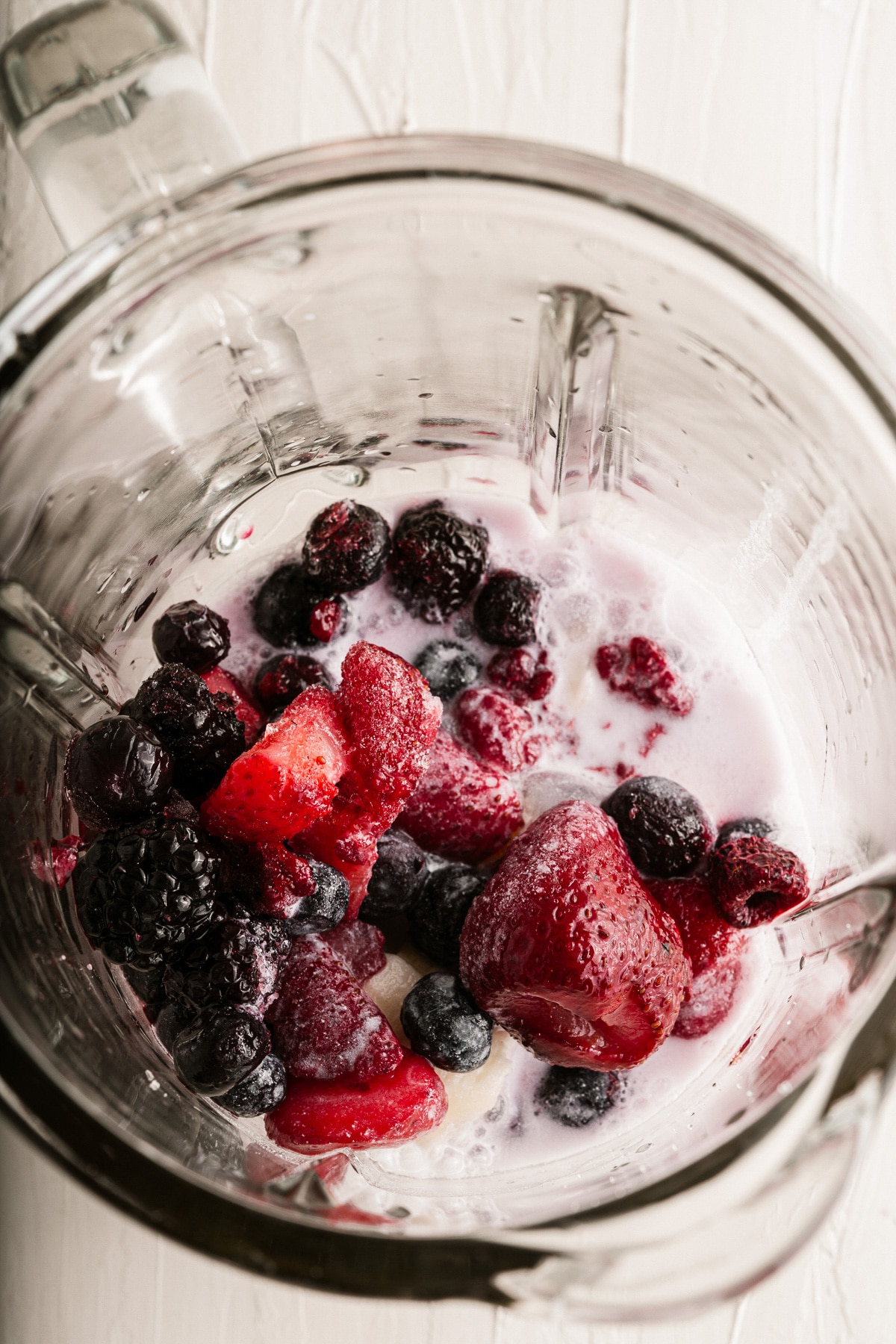 ingredients for smoothie in blender.