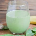 Smoothie in glass on counter.