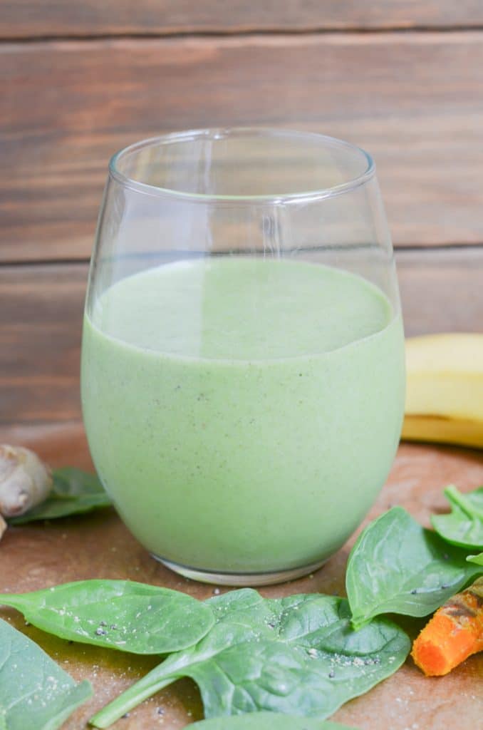 Smoothie in glass on counter.