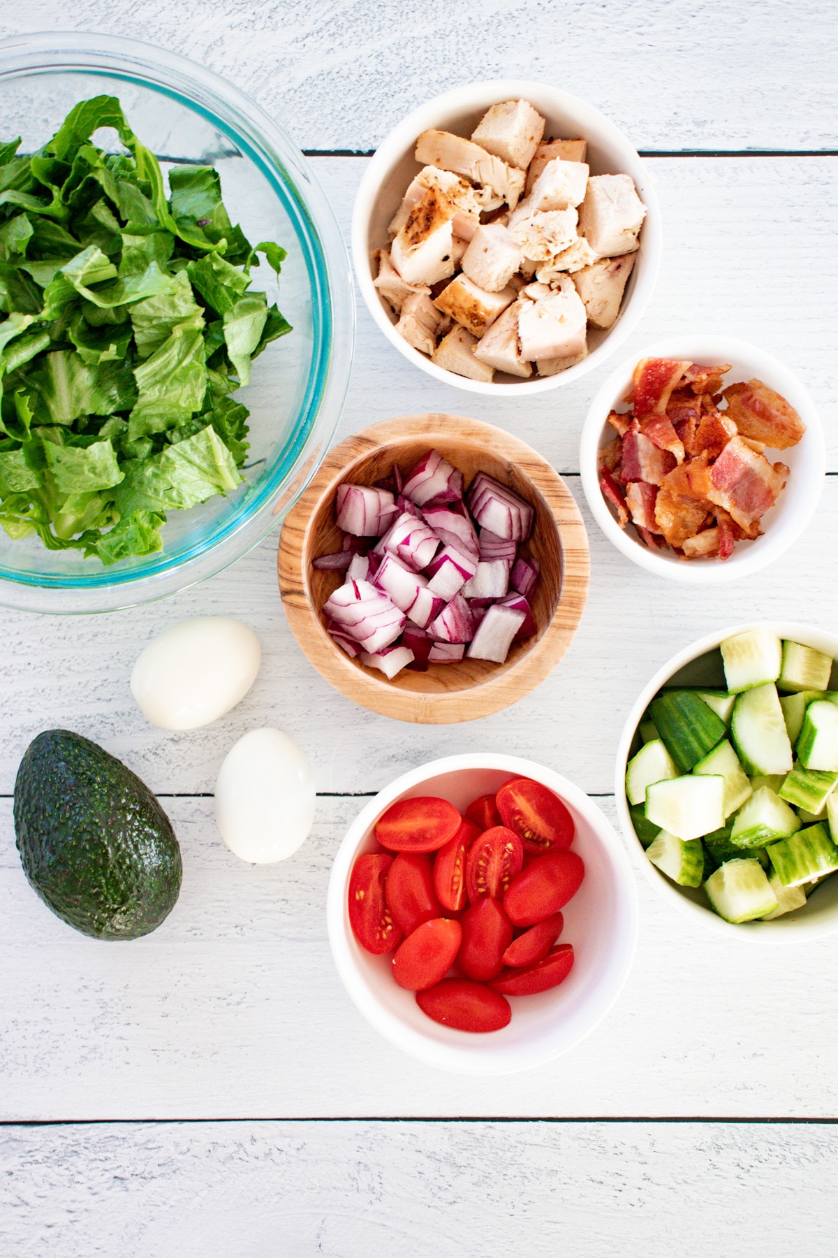 ingredients for chicken cobb salad on counter.