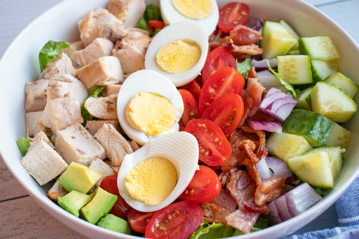 chicken cobb salad in bowl.