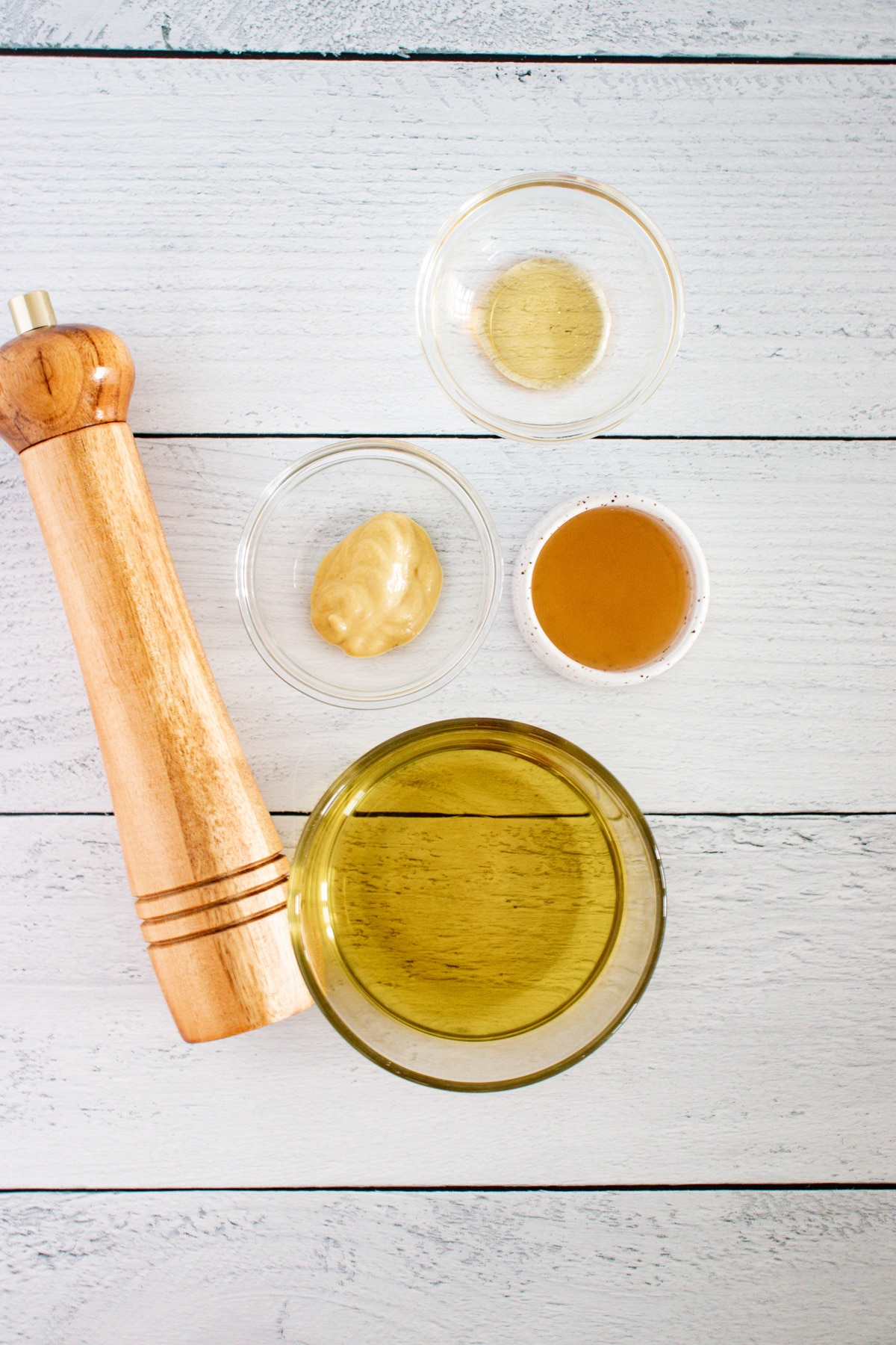 ingredients for salad dressing on counter.