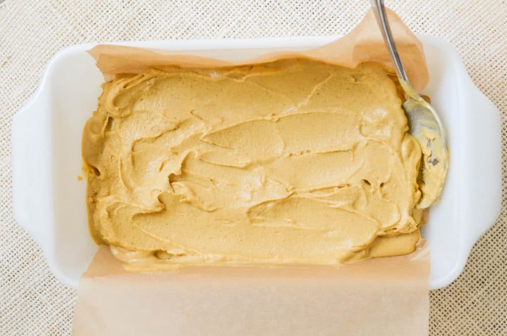 Paleo Pumpkin Ice Cream in freezer container - 24 Carrot Kitchen