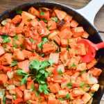 sweet potato hash in cast iron skillet.