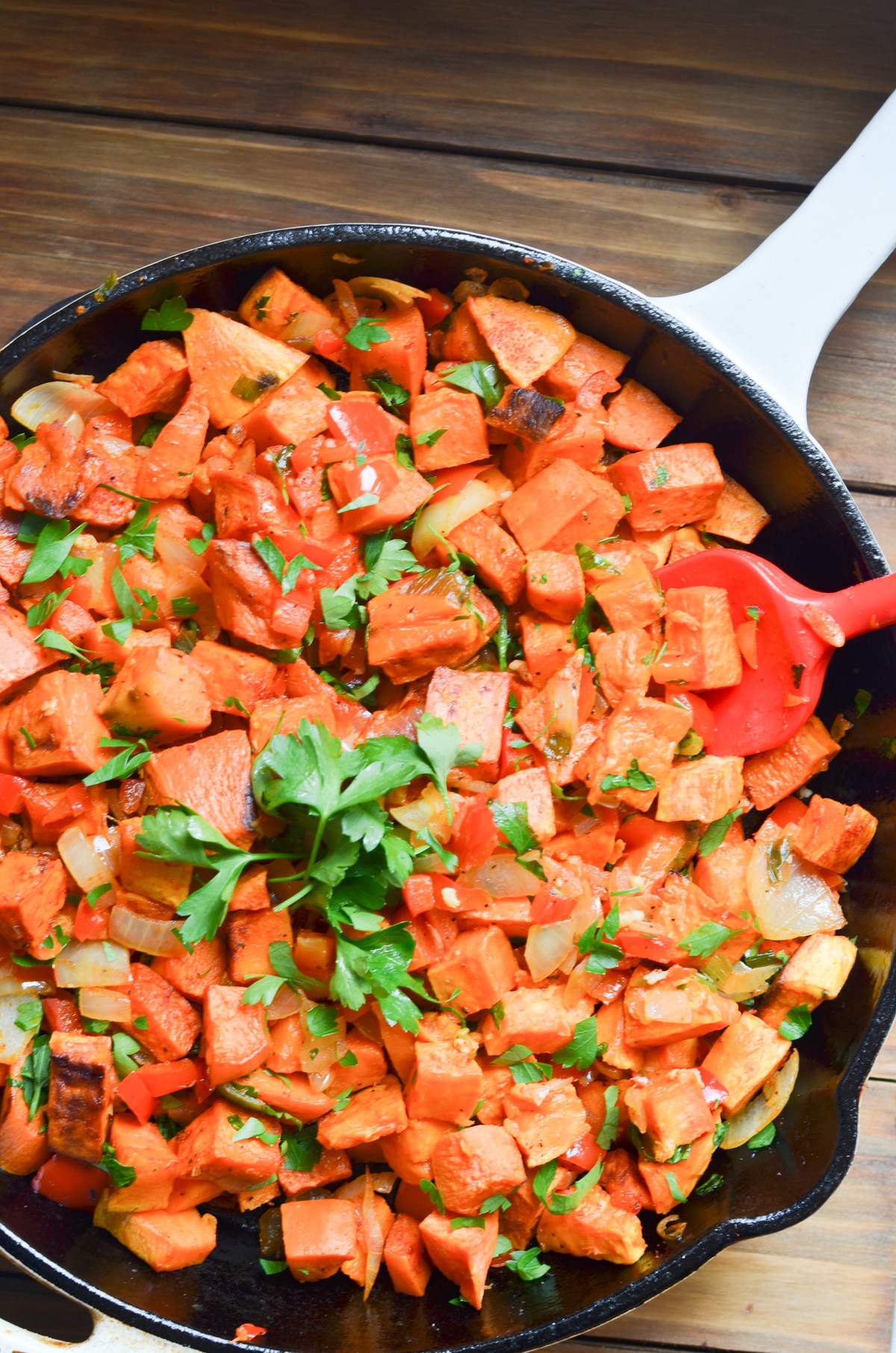 sweet potato hash in cast iron skillet.