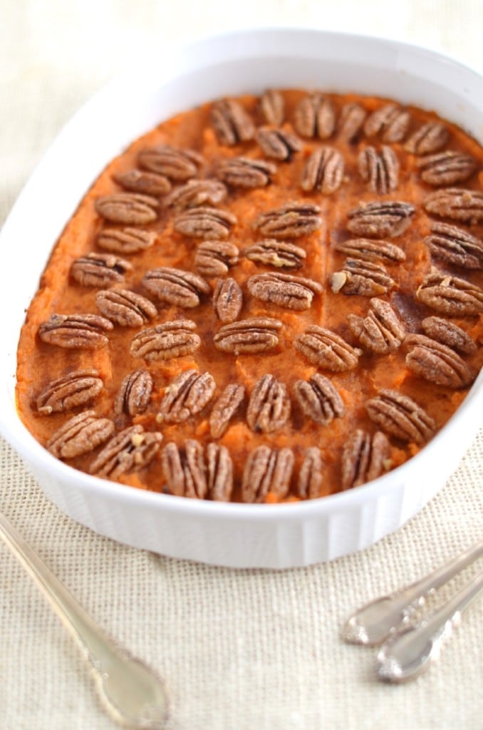 Vegan Sweet Potato Casserole with Candied Pecan Topping in baking dish - 24 Carrot Kitchen