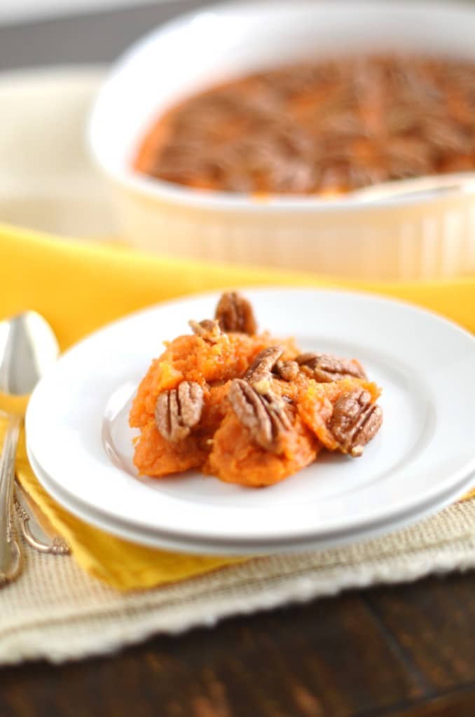 Vegan Sweet Potato Casserole with Candied Pecan Topping on plate - 24 Carrot Kitchen