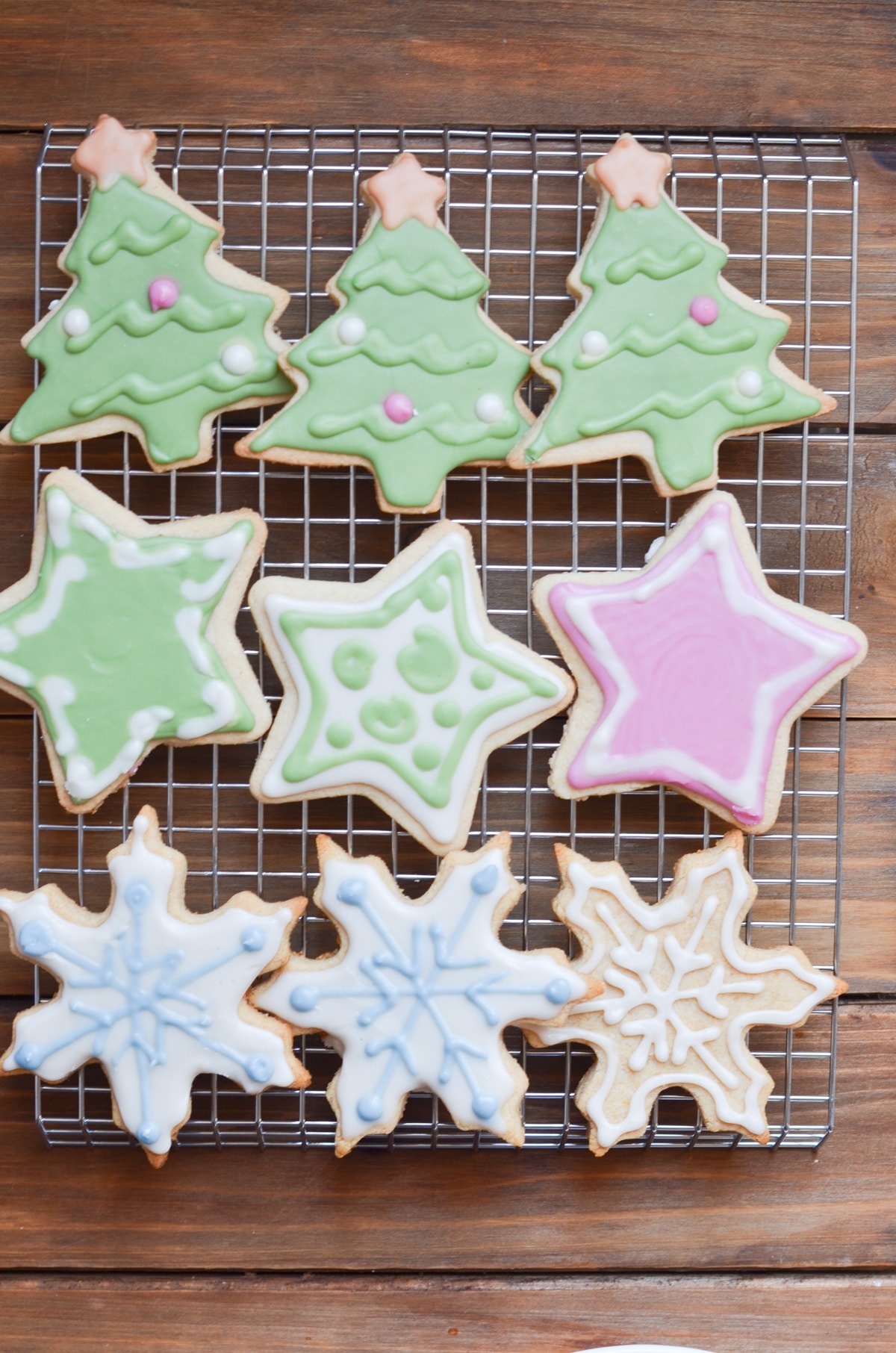 vegan sugar cookies decorated on cooling rack.