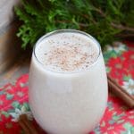 Dairy Free Eggnog in glass with nutmeg.