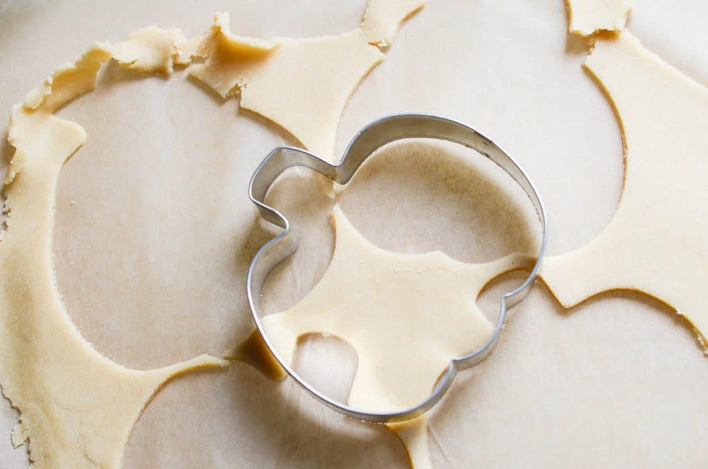 vegan Sugar Cookies cut out with cookie cutter - 24 Carrot Kitchen