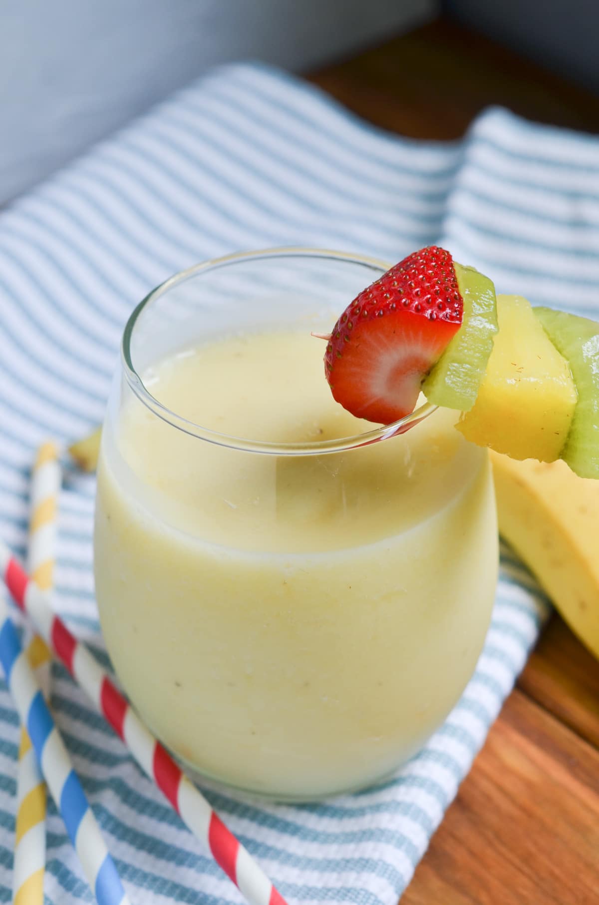 pina colada smoothie in a glass.