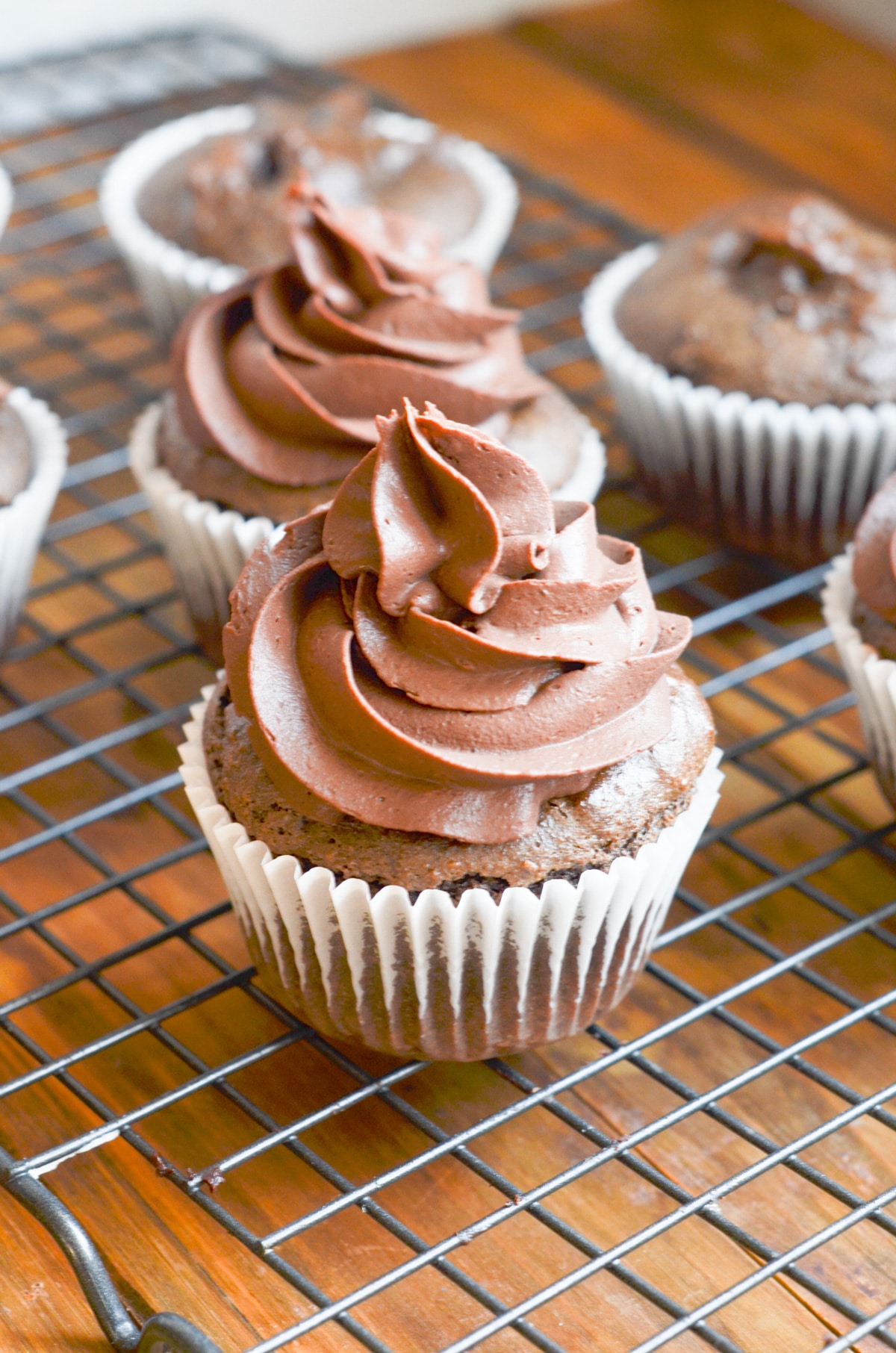 Paleo chocolate cupcakes with chocolate frosting.