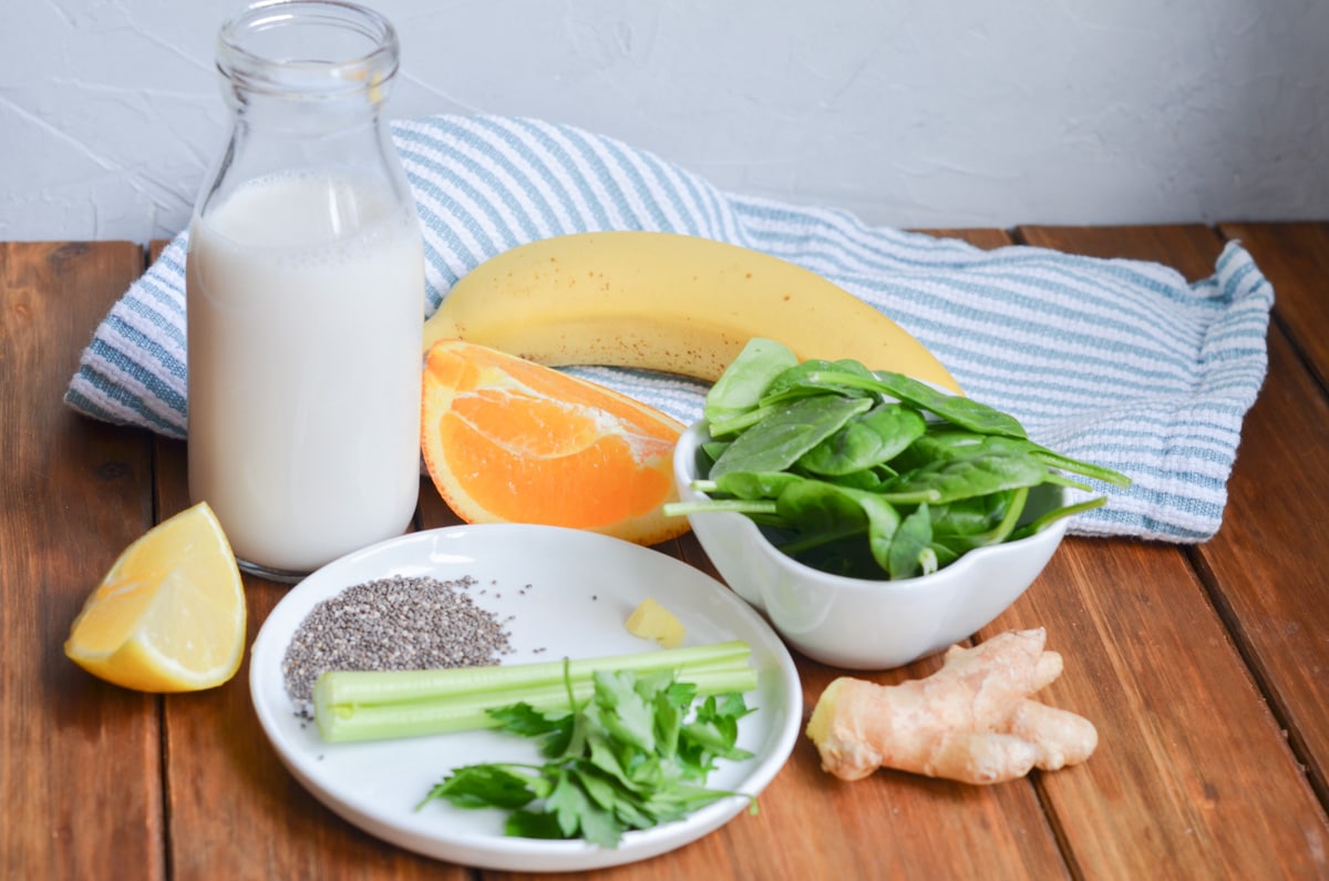 ingredients for green detox smoothie on counter.