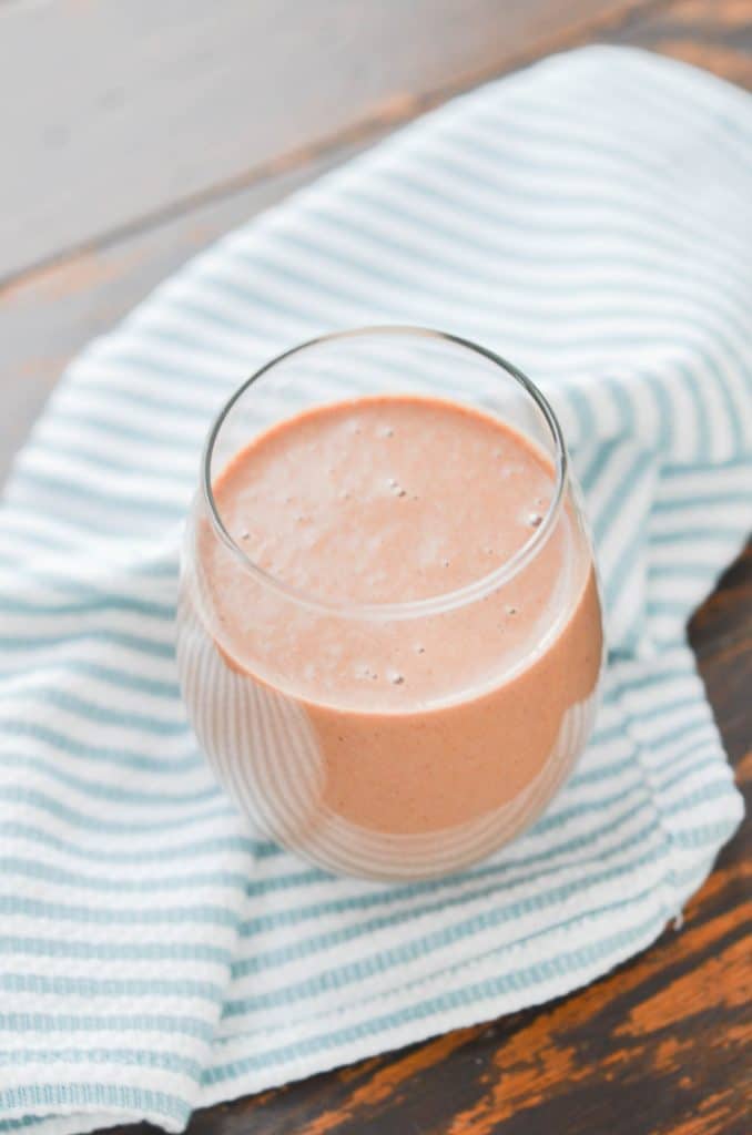 Chocolate Banana Smoothie in glass - 24 Carrot Kitchen