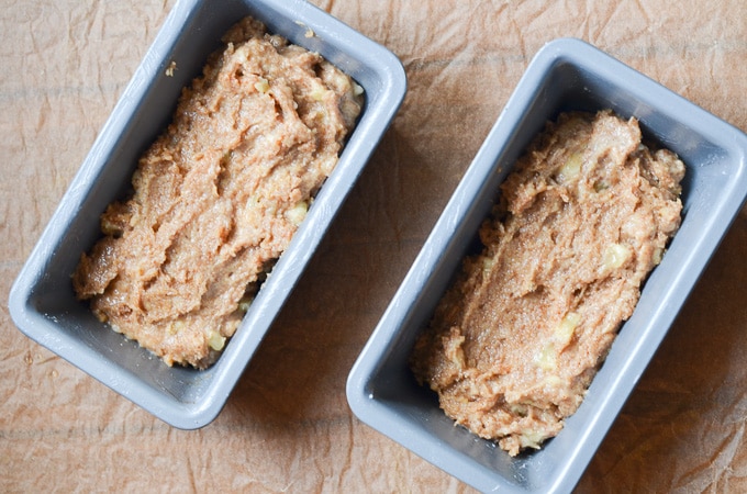 flourless banana bread batter in two mini-loaf pans.