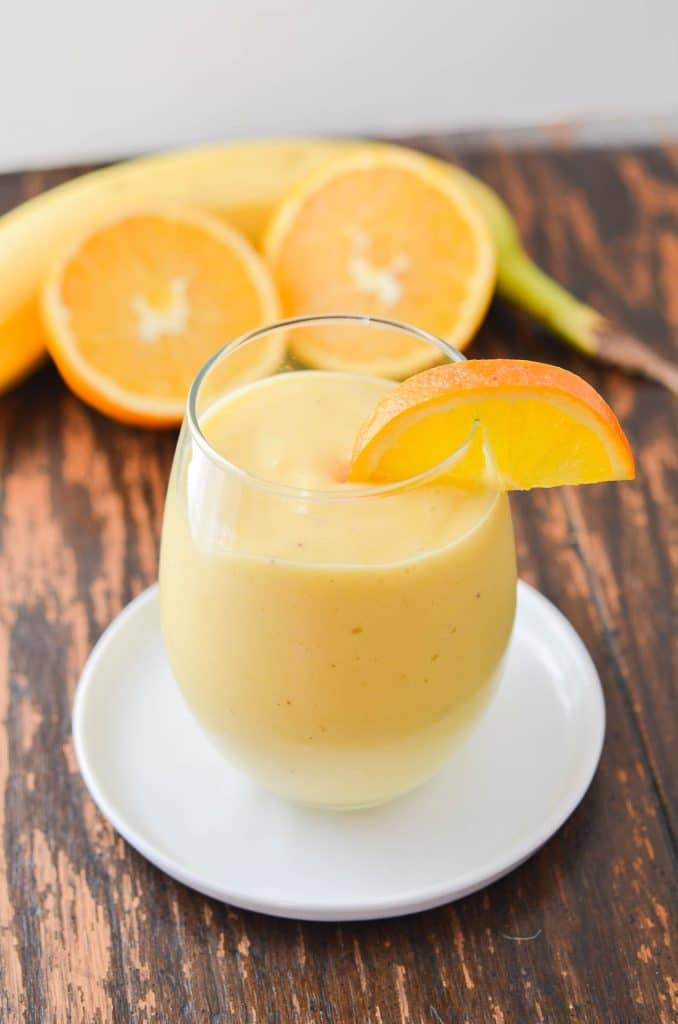 Mango Smoothie in a glass- 24 Carrot Kitchen