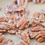 Maple Pecans on baking sheet - 24 Carrot Kitchen