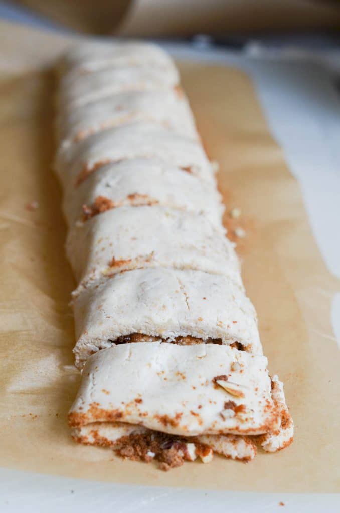 Vegan cinnamon rolls dough cut in slices, ready tor oven. - 24 Carrot Kitchen