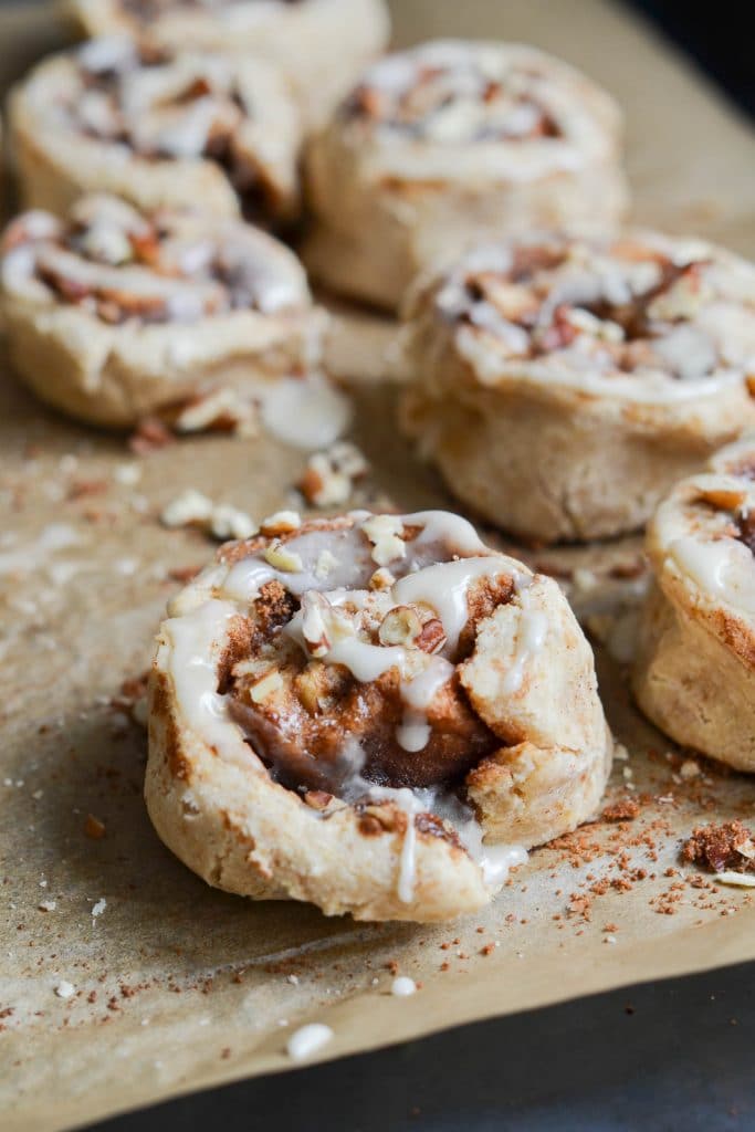 Vegan Cinnamon Rolls frosted on baking pan - 24 Carrot Kitchen