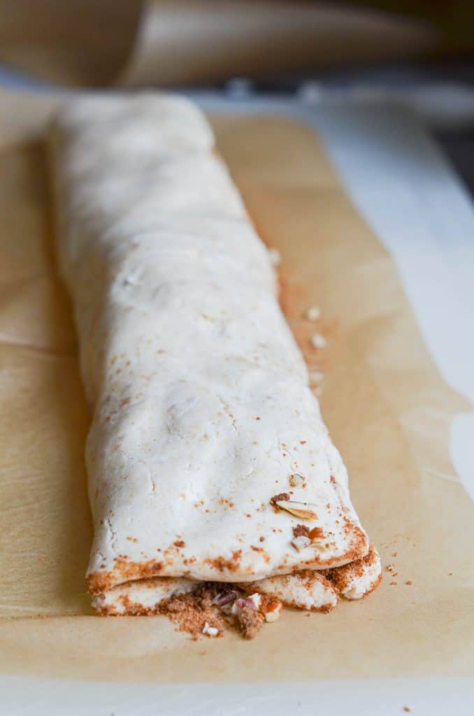 vegan cinnamon rolls dough in a roll - 24 Carrot Kitchen