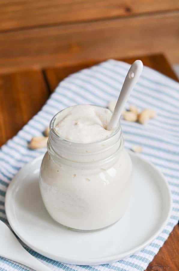 Dairy-free sour cream in glass jar. - 24 Carrot Kitchen