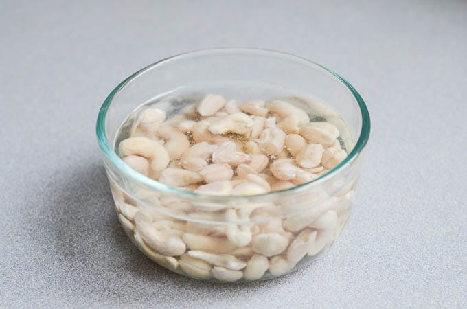 cashews soaking in bowl with water - 24 Carrot Kitchen