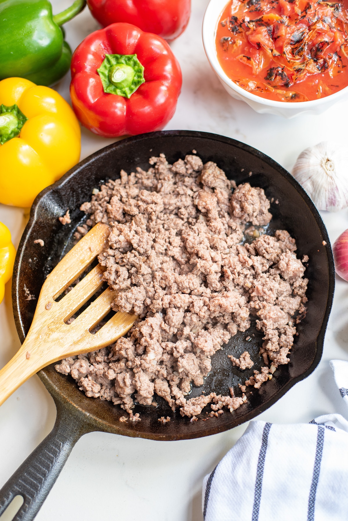 cooking ground meat in cast iron skillet.