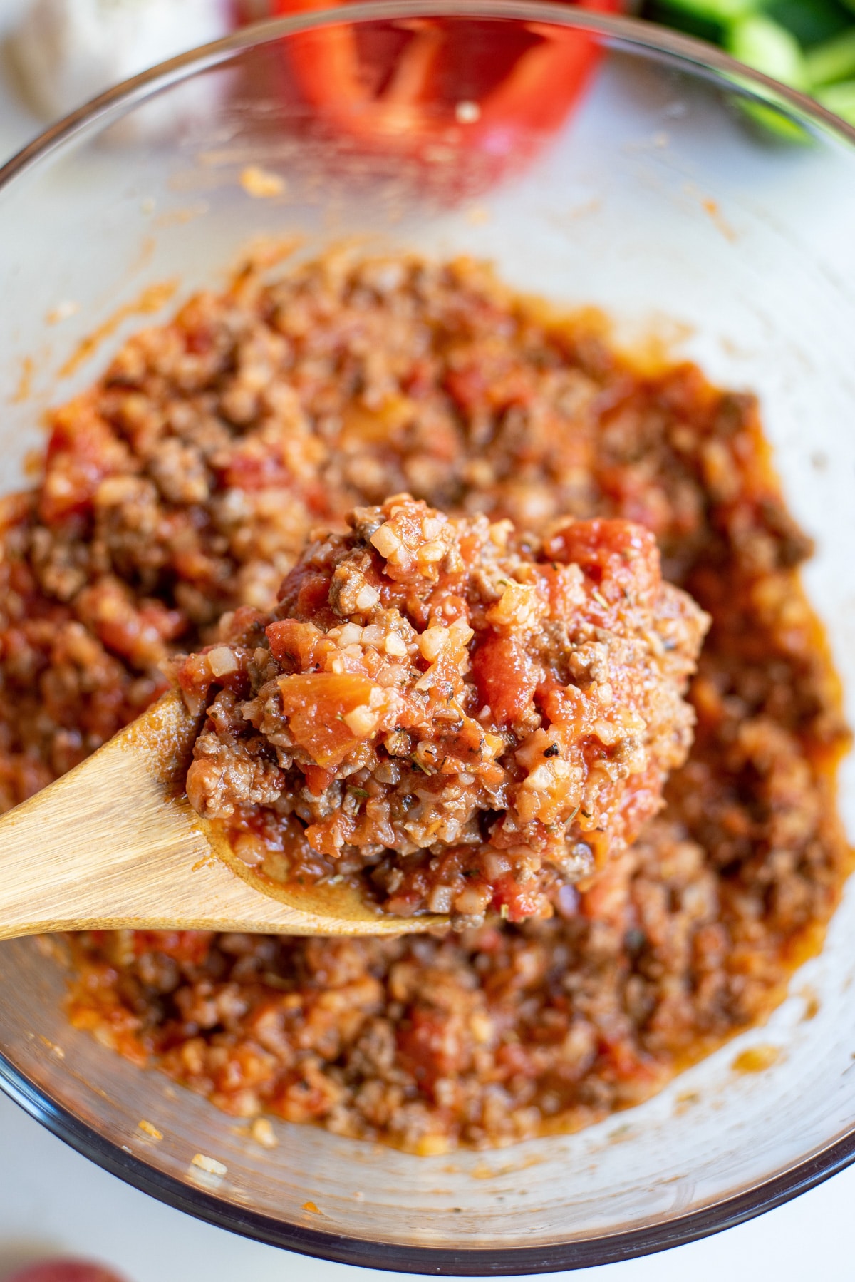 meat plus tomato sauce plus all ingredients in bowl.