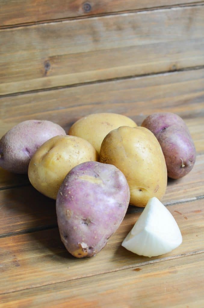 Six potatoes and onion needed for recipe.