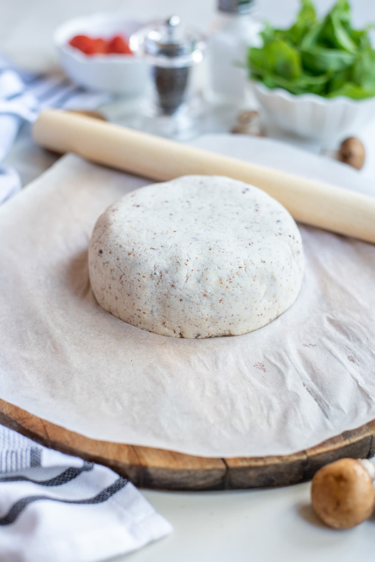 pizza crust ball on parchment paper.