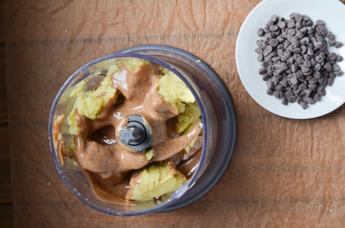 Ingredients for vegan cookie dough in small food processor.