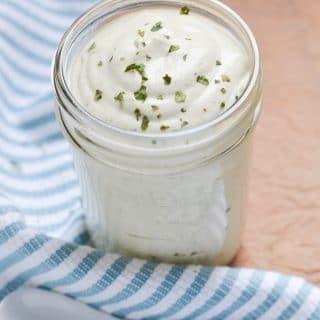 Vegan ranch dressing in glass jar.