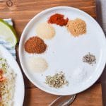 Whole30 spices on a round plate.